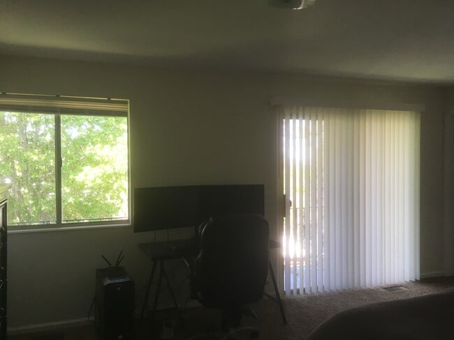 second floor master bedroom with a lot of natural lighting - 2477 E 2100 S