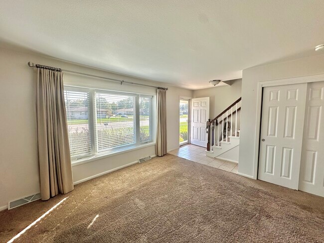 Living Room with Coat Closet - 2748 Mineral Point Ave
