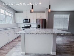 Building Photo - 129 Copperstone Park SE