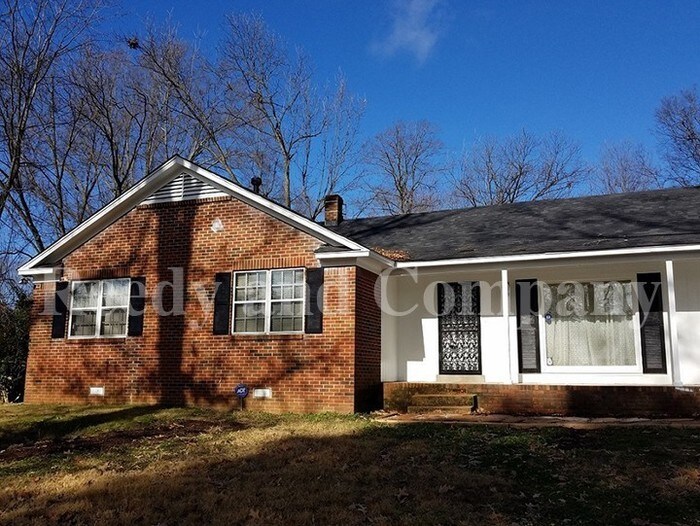 Primary Photo - Garages galore! A must see!