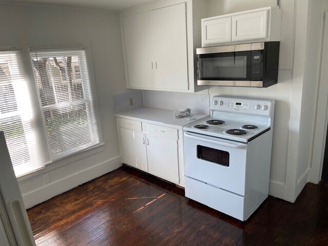 Kitchen with new stove/oven microwave range hood - 208 W Ann St