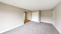 Located at 542 S Broadway in Pennsville, NJ, this single-floor, one-bedroom, one-bathroom residence offers a practical and well-organized layout. The floor plan flows through connecting hallways, linking each room with ease.

The living room is carpeted in a neutral gray tone, complemented by warm beige walls and a textured ceiling. A large window allows natural light to fill the space, offering views of the surrounding area. The room also features a sliding closet, making it a versatile and functional space.

The kitchen is a galley-style layout featuring dark espresso cabinetry, light marble-look countertops, and stainless steel appliances including a range and refrigerator. Light wood-style flooring and a window above the sink brighten the workspace, while ample upper and lower cabinetry provide generous storage.

The bedroom carries the same neutral carpeting and beige tones as the living area, with a textured ceiling and a sliding double-door closet offering practical storage. The room is well-sized and quiet, designed with comfort in mind.

The bathroom is clean and bright, featuring a full tub and shower combination with white subway tile surround, accented by a decorative mosaic tile border, and chrome fixtures throughout.

Together, these spaces create a cohesive, move-in-ready residence with a consistent neutral palette and functional design throughout.