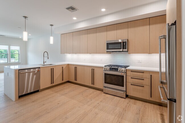 1BR, 1BA + Den - 864SF - Kitchen - The 545