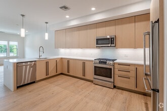1BR, 1BA + Den - 864SF - Kitchen - The 545