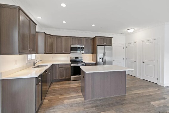 Kitchen w stainless & quartz - 8102 Admirals Walk Dr