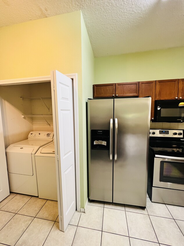 Gourmet Kitchen with Laundry cabinet - 71 Emerald Bay Dr