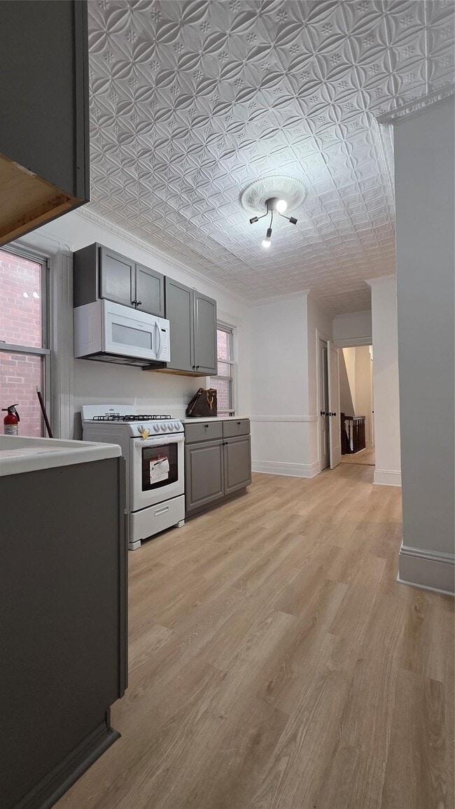 Building Photo - 42-21 65th Pl