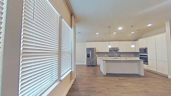 Building Photo - Elegant 4-Bedroom Home with Luxurious Feat...