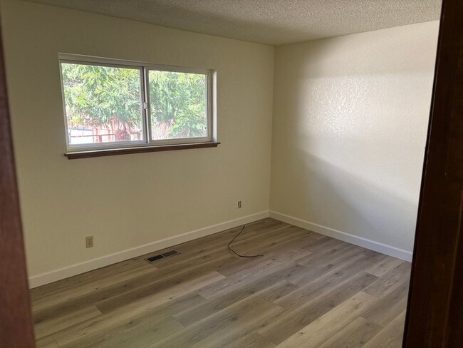 Building Photo - One level cabin with fenced backyard and garage