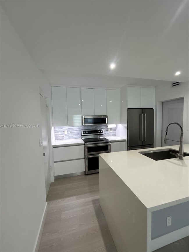 Foto del edificio - 900 River Reach Dr