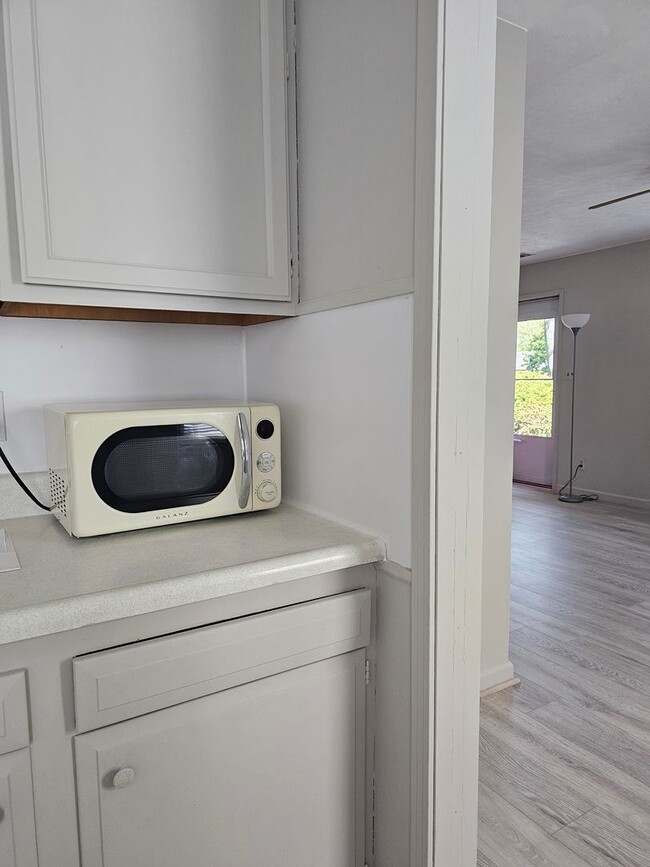 Building Photo - Very updated, cozy two bedroom across from...