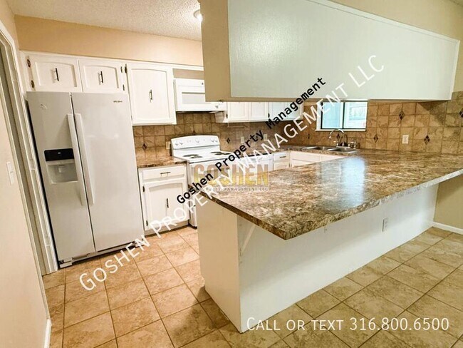 Foto del edificio - 8708 W University St