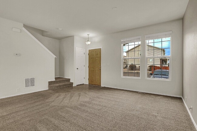 Building Photo - Updated 2-Bed Townhome Just Minutes from F...