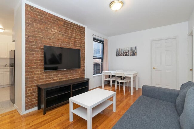 Building Photo - 309-311-311 E 95th St