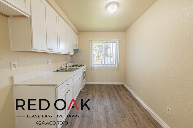 Building Photo - ~1 Month FREE~ Lovely Studio with Hardwood...