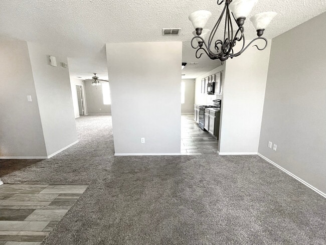 Front entry looking to living/kitchen - 1419 Windy Meadows Dr