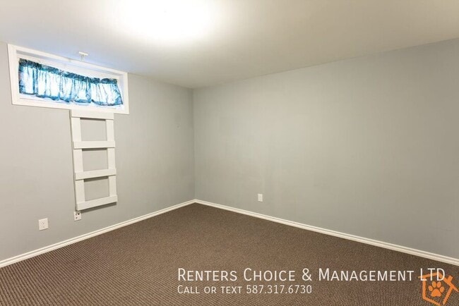 Building Photo - Pet Friendly Basement Suite with Garage, Utilities Included