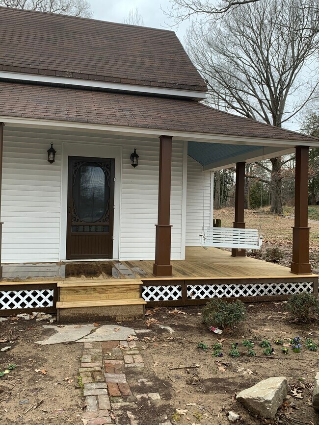 New tongue and groove porch with swing - 117 Covington St