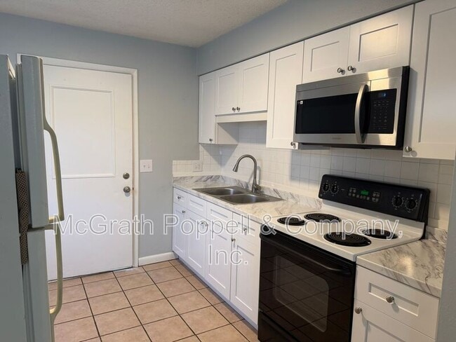 Photo - 1408 E Spencer St Apartment