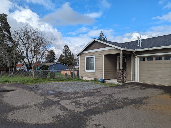 Front (left side of duplex) - 713 E Main St