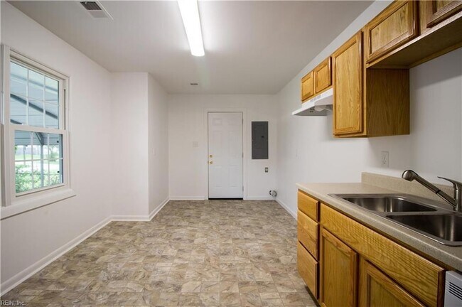 Foto del edificio - 1343 W 39th St