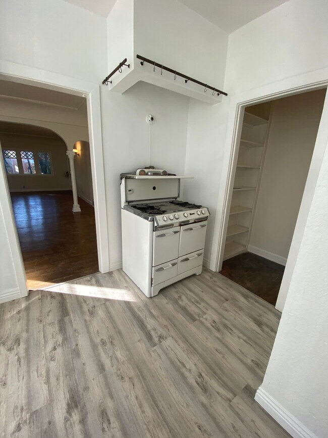 Antique stove with new floors - 1040 S Orange Dr