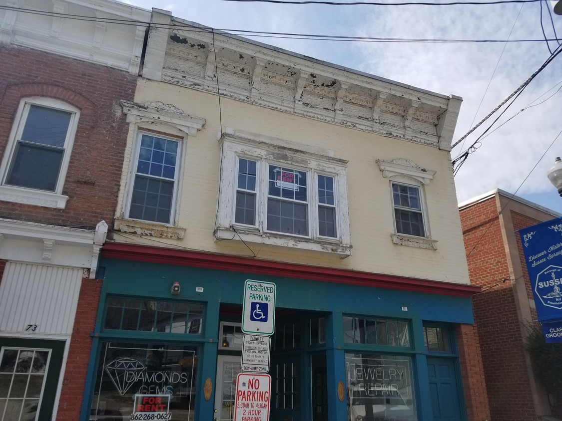 Front apartment above store front. - 75 Main St