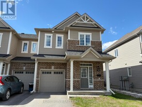 Building Photo - 360 Mélodie St
