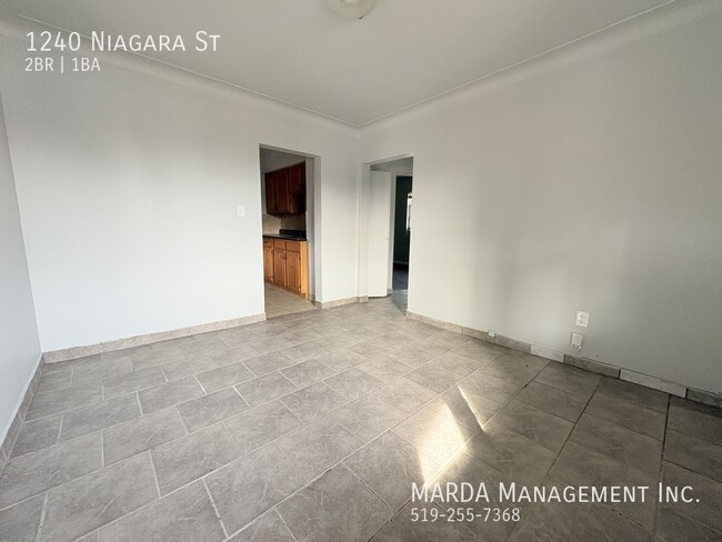 Building Photo - BRIGHT AND COZY 2BEDROOM/1BATH UPPER UNIT ...