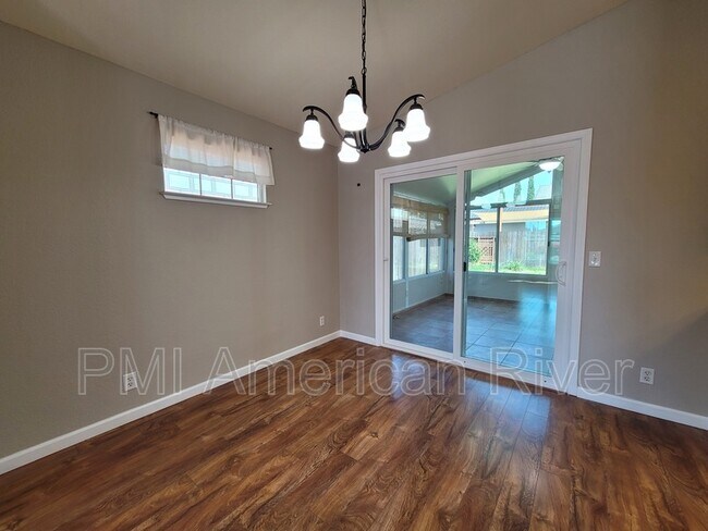 Building Photo - 8715 Rooster Way