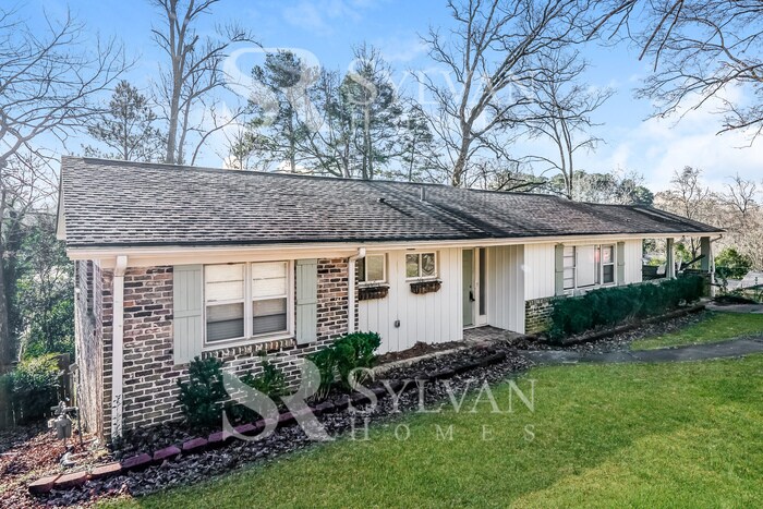 Primary Photo - The living is easy in this 4 bedroom, 3 ba...