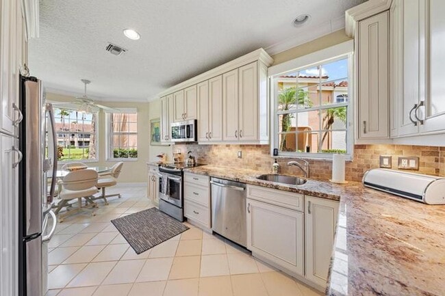Photo - 120 LEGENDARY Circle, Palm Beach Gardens, FL 33418 House