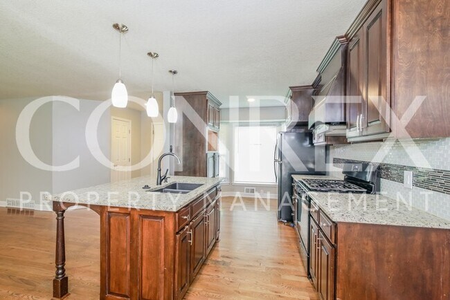 Foto del edificio - Darling 4 Bedroom, 2.5 Bath Ranch in Raytown!