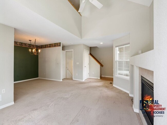 Building Photo - Fort Collins Townhouse with Vaulted Ceilin...