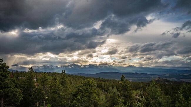 Sunset over the mountains, view from deck - 153 Skyline Dr.