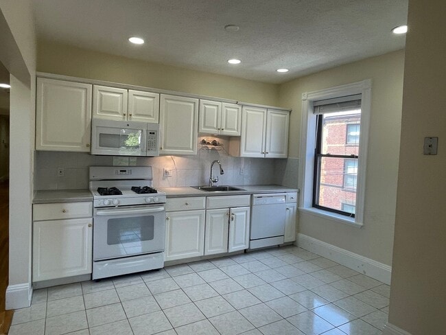 Photo - Large, updated 3 bed unit in a prime location in Brookline! House