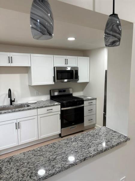 Building Photo - 1615 Manhattan St