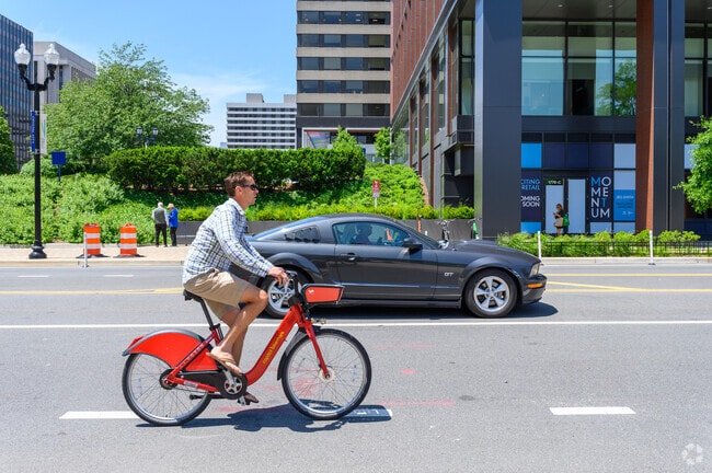Cyclists share the road with cars in Crystal City.