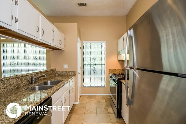 Building Photo - 6350 Laurel Post Dr