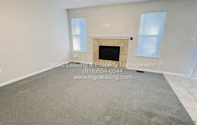 Building Photo - Baltimore Townhomes: 3 Bedroom Townhome with 2-Car Garage - North of the River in KCMO