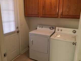 Utility room with washer and dryer. - 907 Bagwell Dr