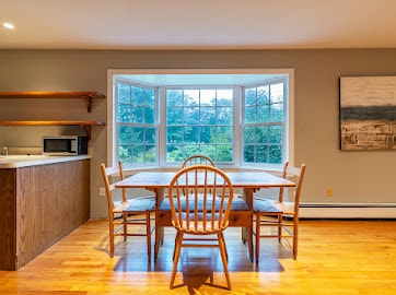 Picture Window in Dining Area with Beautiful View of Perennial Gardens - 287 Belden Hill Rd