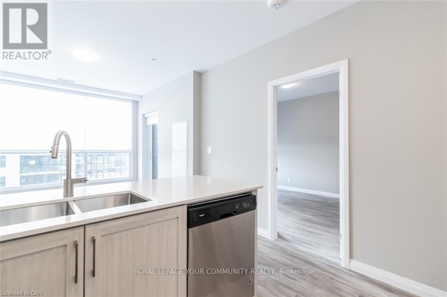 Building Photo - 104-1104 Garment St