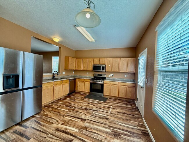 Building Photo - Stunning Townhome in Fountain, CO — Mountain Views, Corner Lot, Minutes from Fort Carson & Peters...
