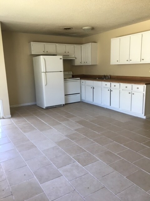 newly tiled kitchen. Refrig and stove - 111 Issac Drive