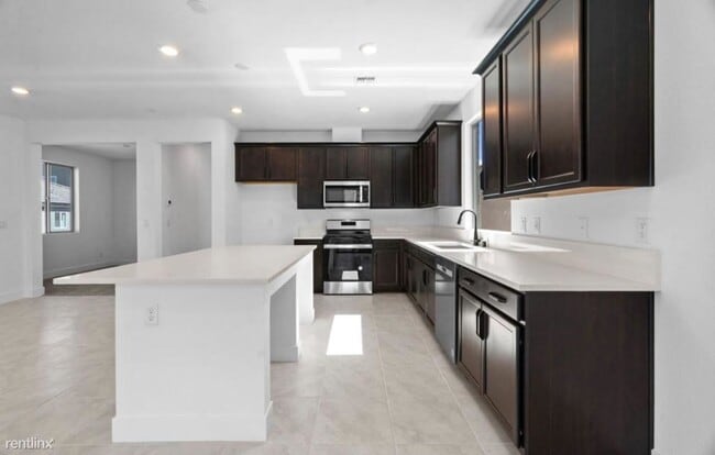 Building Photo - 4 br, 3 bath House - 10372 Restless River ...