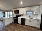 Kitchen with Dishwasher and modern appliances - 19126 Edgewater Rd NE