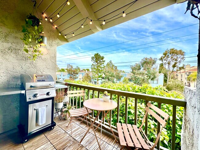 good sized balcony w/ tree-top views, new gas BBQ, and cafe set - 8740 Tuscany Ave