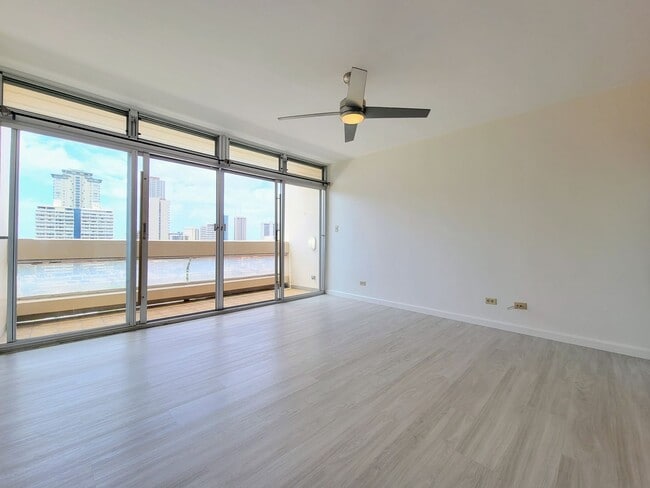 Building Photo - Available Now: A 1 Bedroom, 1 Bathroom Condo with 1 Assigned Parking Stall