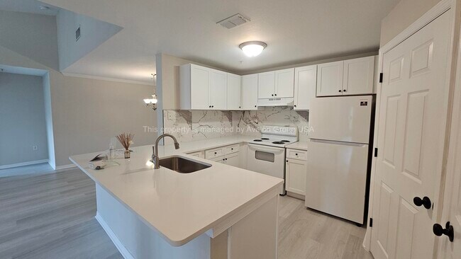 Foto del edificio - 7800 Point Meadows Dr